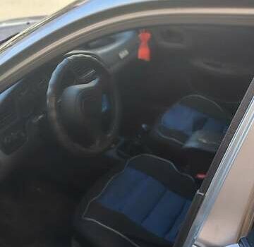 Деу Ланос 2005 у Харкові на Automoto.ua Сірий Деу Ланос, об'ємом двигуна 1.5 л та пробігом 290 тис. км за 2000 $, фото 1 на Automoto.ua