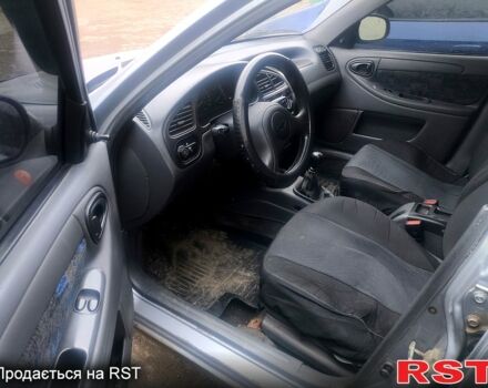 Серый Дэу Ланос, объемом двигателя 1.5 л и пробегом 241 тыс. км за 2750 $, фото 5 на Automoto.ua