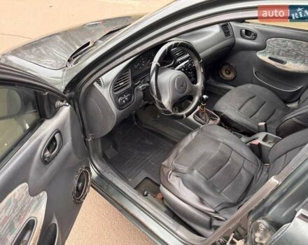 Серый Дэу Ланос, объемом двигателя 1.5 л и пробегом 250 тыс. км за 1250 $, фото 10 на Automoto.ua