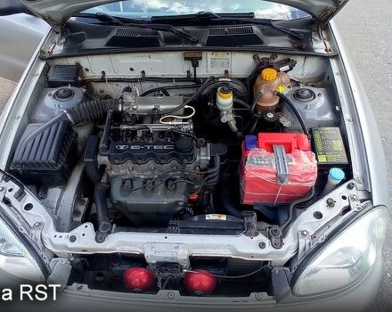 Серый Дэу Ланос, объемом двигателя 1.5 л и пробегом 318 тыс. км за 1960 $, фото 2 на Automoto.ua