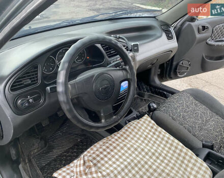 Серый Дэу Ланос, объемом двигателя 1.5 л и пробегом 432 тыс. км за 2400 $, фото 12 на Automoto.ua