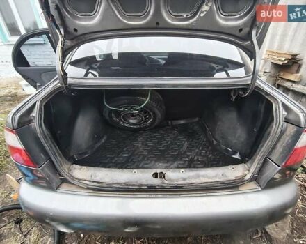 Серый Дэу Ланос, объемом двигателя 1.5 л и пробегом 217 тыс. км за 1700 $, фото 8 на Automoto.ua