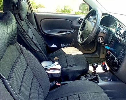 Серый Дэу Ланос, объемом двигателя 1.5 л и пробегом 318 тыс. км за 1960 $, фото 4 на Automoto.ua