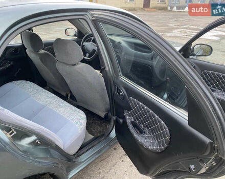 Серый Дэу Ланос, объемом двигателя 1.5 л и пробегом 432 тыс. км за 2400 $, фото 9 на Automoto.ua