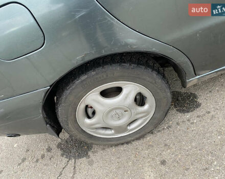 Серый Дэу Ланос, объемом двигателя 1.5 л и пробегом 432 тыс. км за 2400 $, фото 18 на Automoto.ua