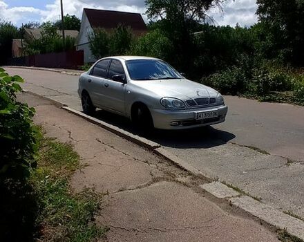 Серый Дэу Ланос, объемом двигателя 1.5 л и пробегом 318 тыс. км за 1960 $, фото 6 на Automoto.ua