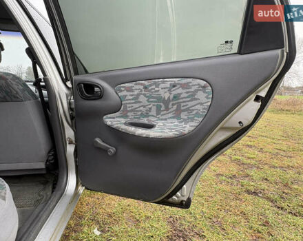 Серый Дэу Ланос, объемом двигателя 1.5 л и пробегом 309 тыс. км за 2000 $, фото 5 на Automoto.ua