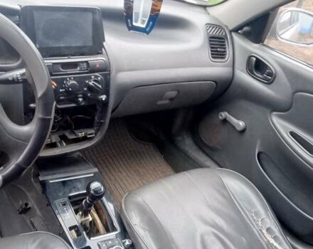 Серый Дэу Ланос, объемом двигателя 1.5 л и пробегом 400 тыс. км за 1650 $, фото 1 на Automoto.ua