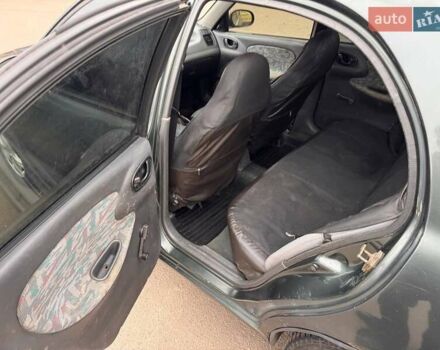 Серый Дэу Ланос, объемом двигателя 1.5 л и пробегом 250 тыс. км за 1250 $, фото 9 на Automoto.ua