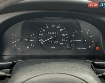 Серый Дэу Ланос, объемом двигателя 1.5 л и пробегом 164 тыс. км за 1655 $, фото 41 на Automoto.ua