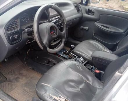 Серый Дэу Ланос, объемом двигателя 1.5 л и пробегом 400 тыс. км за 1650 $, фото 2 на Automoto.ua