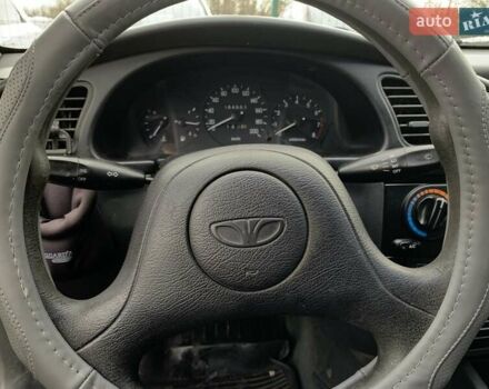 Серый Дэу Ланос, объемом двигателя 1.5 л и пробегом 164 тыс. км за 1655 $, фото 36 на Automoto.ua