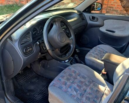 Серый Дэу Ланос, объемом двигателя 1.5 л и пробегом 300 тыс. км за 1550 $, фото 3 на Automoto.ua