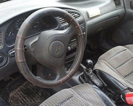 Сірий Деу Ланос, об'ємом двигуна 1.5 л та пробігом 147 тис. км за 2650 $, фото 3 на Automoto.ua