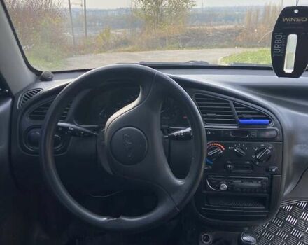 Серый Дэу Ланос, объемом двигателя 1.5 л и пробегом 334 тыс. км за 1800 $, фото 9 на Automoto.ua