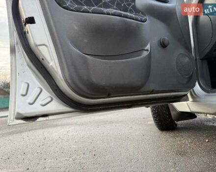 Сірий Деу Ланос, об'ємом двигуна 1.35 л та пробігом 116 тис. км за 1950 $, фото 13 на Automoto.ua