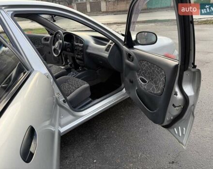 Сірий Деу Ланос, об'ємом двигуна 1.35 л та пробігом 116 тис. км за 1950 $, фото 12 на Automoto.ua