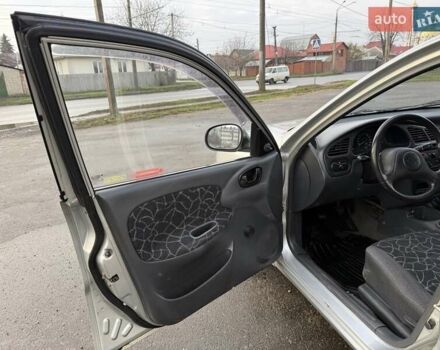 Сірий Деу Ланос, об'ємом двигуна 1.35 л та пробігом 116 тис. км за 1950 $, фото 8 на Automoto.ua