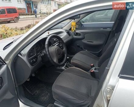 Сірий Деу Ланос, об'ємом двигуна 1.5 л та пробігом 306 тис. км за 2000 $, фото 9 на Automoto.ua