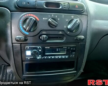 Серый Дэу Ланос, объемом двигателя 1.5 л и пробегом 320 тыс. км за 1600 $, фото 1 на Automoto.ua