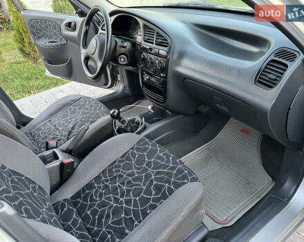 Серый Дэу Ланос, объемом двигателя 1.5 л и пробегом 152 тыс. км за 1999 $, фото 26 на Automoto.ua