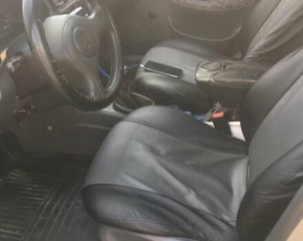 Серый Дэу Ланос, объемом двигателя 1.5 л и пробегом 320 тыс. км за 3500 $, фото 3 на Automoto.ua