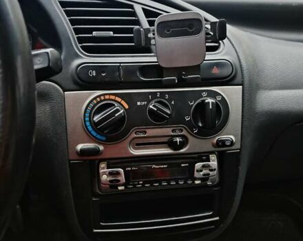 Серый Дэу Ланос, объемом двигателя 1.5 л и пробегом 314 тыс. км за 1500 $, фото 7 на Automoto.ua