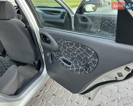 Серый Дэу Ланос, объемом двигателя 1.5 л и пробегом 152 тыс. км за 1999 $, фото 28 на Automoto.ua