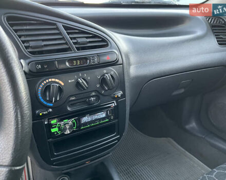 Серый Дэу Ланос, объемом двигателя 1.5 л и пробегом 152 тыс. км за 1999 $, фото 18 на Automoto.ua