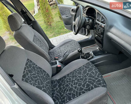 Серый Дэу Ланос, объемом двигателя 1.5 л и пробегом 152 тыс. км за 1999 $, фото 25 на Automoto.ua