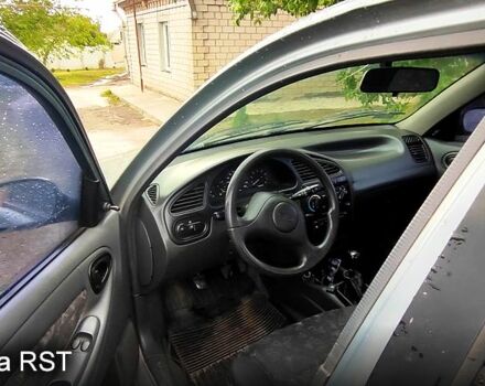 Сірий Деу Ланос, об'ємом двигуна 1.5 л та пробігом 184 тис. км за 1900 $, фото 5 на Automoto.ua