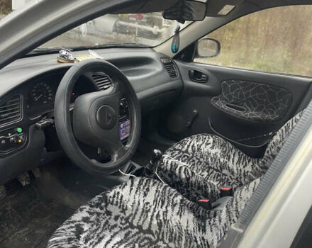 Сірий Деу Ланос, об'ємом двигуна 1.5 л та пробігом 230 тис. км за 1900 $, фото 7 на Automoto.ua