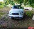 Сірий Деу Ланос, об'ємом двигуна 1.5 л та пробігом 144 тис. км за 2000 $, фото 1 на Automoto.ua