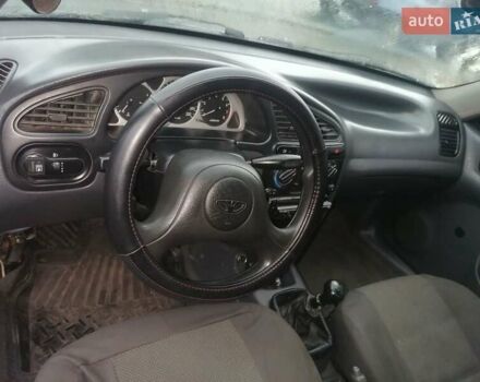 Серый Дэу Ланос, объемом двигателя 1.5 л и пробегом 220 тыс. км за 2200 $, фото 4 на Automoto.ua