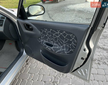 Серый Дэу Ланос, объемом двигателя 1.5 л и пробегом 152 тыс. км за 1999 $, фото 27 на Automoto.ua