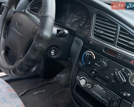 Сірий Деу Ланос, об'ємом двигуна 1.5 л та пробігом 378 тис. км за 1599 $, фото 10 на Automoto.ua