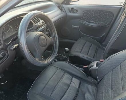 Серый Дэу Ланос, объемом двигателя 1.6 л и пробегом 270 тыс. км за 1000 $, фото 6 на Automoto.ua