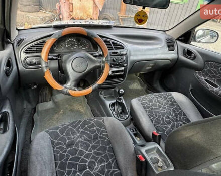 Сірий Деу Ланос, об'ємом двигуна 1.5 л та пробігом 245 тис. км за 1199 $, фото 3 на Automoto.ua