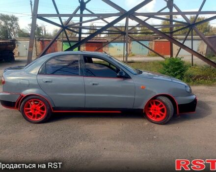 Дэу Ланос 2003 в Запорожье на Automoto.ua Серый Дэу Ланос, объемом двигателя 1.5 л и пробегом 242 тыс. км за 2200 $, фото 3 на Automoto.ua