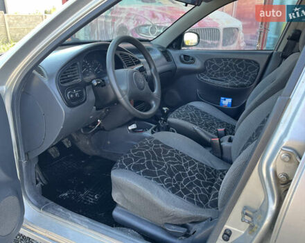 Серый Дэу Ланос, объемом двигателя 1.5 л и пробегом 300 тыс. км за 1600 $, фото 3 на Automoto.ua