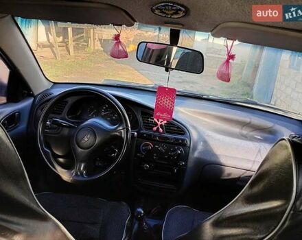 Серый Дэу Ланос, объемом двигателя 1.35 л и пробегом 306 тыс. км за 1600 $, фото 4 на Automoto.ua