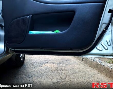 Дэу Ланос 2003 в Днепре (Днепропетровске) на Automoto.ua Серый Дэу Ланос, объемом двигателя 1.6 л и пробегом 287 тыс. км за 3200 $, фото 7 на Automoto.ua