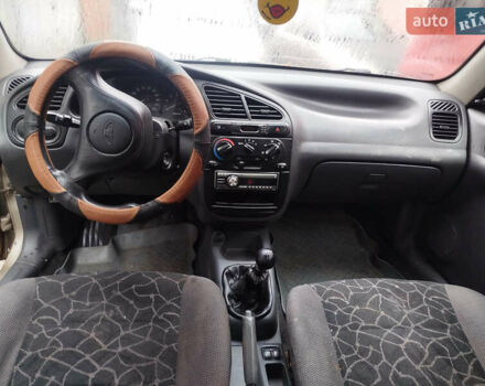 Сірий Деу Ланос, об'ємом двигуна 1.5 л та пробігом 245 тис. км за 1199 $, фото 5 на Automoto.ua