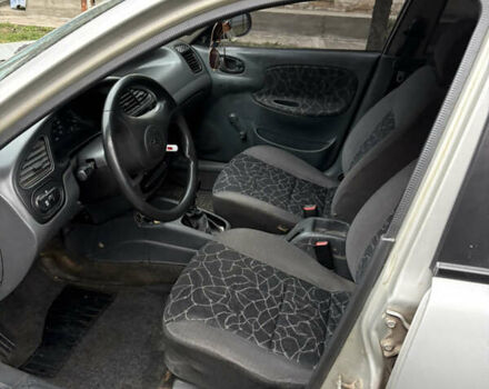 Сірий Деу Ланос, об'ємом двигуна 0 л та пробігом 254 тис. км за 1450 $, фото 14 на Automoto.ua