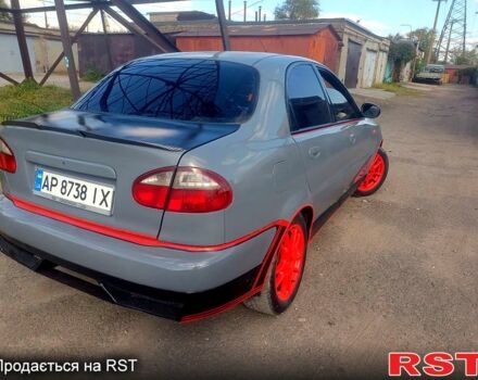 Дэу Ланос 2003 в Запорожье на Automoto.ua Серый Дэу Ланос, объемом двигателя 1.5 л и пробегом 242 тыс. км за 2200 $, фото 1 на Automoto.ua