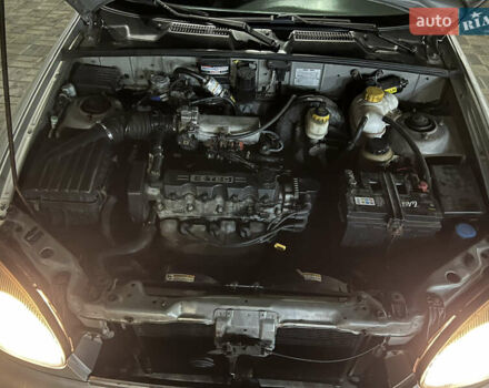 Серый Дэу Ланос, объемом двигателя 1.5 л и пробегом 268 тыс. км за 2400 $, фото 18 на Automoto.ua