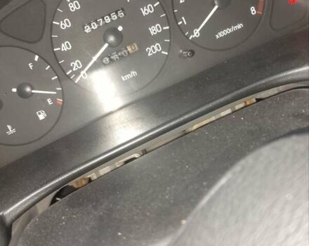 Серый Дэу Ланос, объемом двигателя 1.5 л и пробегом 207 тыс. км за 2000 $, фото 6 на Automoto.ua