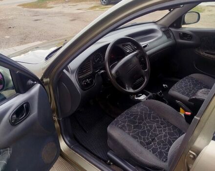 Сірий Деу Ланос, об'ємом двигуна 1.6 л та пробігом 0 тис. км за 1600 $, фото 2 на Automoto.ua