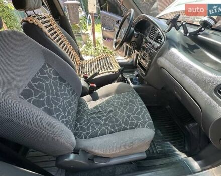 Серый Дэу Ланос, объемом двигателя 1.5 л и пробегом 204 тыс. км за 2800 $, фото 11 на Automoto.ua