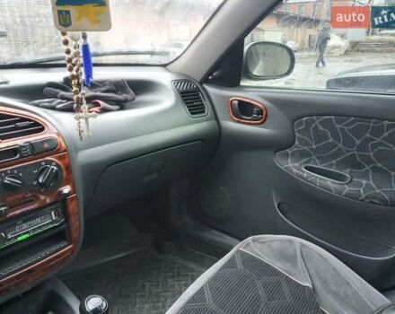 Серый Дэу Ланос, объемом двигателя 1.5 л и пробегом 350 тыс. км за 2400 $, фото 19 на Automoto.ua